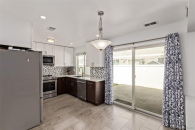 How would you like a monthly electric bill of only $63? Paid off on Green Valley Ranch Golf Club in Colorado - for sale on GolfHomes.com, golf home, golf lot