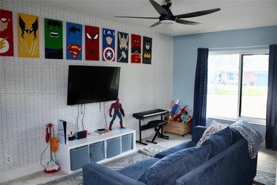 Experience Waterfront Living with this 5-bed, 4-bath Pool Home on Jacaranda Golf Club in Florida - for sale on GolfHomes.com, golf home, golf lot