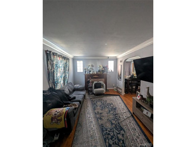 Nestled on a quiet, well-manicured street in the charming town on Normandie Golf Club in Missouri - for sale on GolfHomes.com, golf home, golf lot