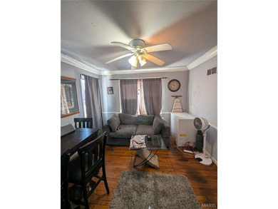 Nestled on a quiet, well-manicured street in the charming town on Normandie Golf Club in Missouri - for sale on GolfHomes.com, golf home, golf lot