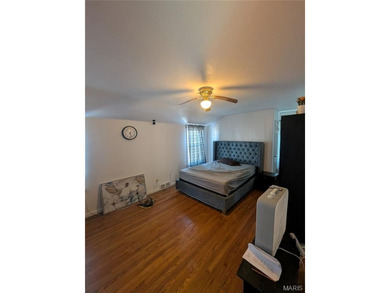 Nestled on a quiet, well-manicured street in the charming town on Normandie Golf Club in Missouri - for sale on GolfHomes.com, golf home, golf lot