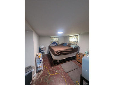 Nestled on a quiet, well-manicured street in the charming town on Normandie Golf Club in Missouri - for sale on GolfHomes.com, golf home, golf lot