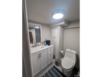 Nestled on a quiet, well-manicured street in the charming town on Normandie Golf Club in Missouri - for sale on GolfHomes.com, golf home, golf lot