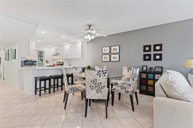 Welcome HOME to this updated corner unit with an open-concept on Palm-Aire Country Club and Resort - The Oaks in Florida - for sale on GolfHomes.com, golf home, golf lot