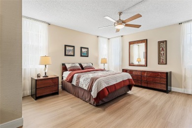 Welcome HOME to this updated corner unit with an open-concept on Palm-Aire Country Club and Resort - The Oaks in Florida - for sale on GolfHomes.com, golf home, golf lot