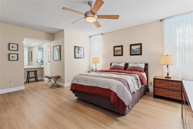 Welcome HOME to this updated corner unit with an open-concept on Palm-Aire Country Club and Resort - The Oaks in Florida - for sale on GolfHomes.com, golf home, golf lot