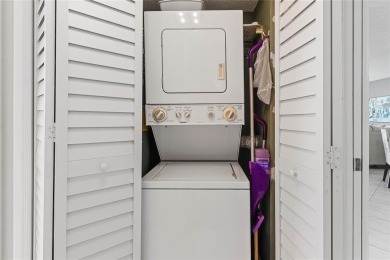 Welcome HOME to this updated corner unit with an open-concept on Palm-Aire Country Club and Resort - The Oaks in Florida - for sale on GolfHomes.com, golf home, golf lot