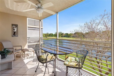 Welcome HOME to this updated corner unit with an open-concept on Palm-Aire Country Club and Resort - The Oaks in Florida - for sale on GolfHomes.com, golf home, golf lot
