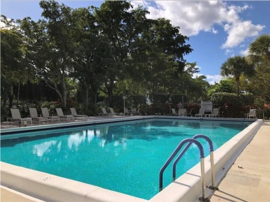 Welcome HOME to this updated corner unit with an open-concept on Palm-Aire Country Club and Resort - The Oaks in Florida - for sale on GolfHomes.com, golf home, golf lot