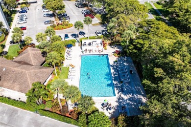 Welcome HOME to this updated corner unit with an open-concept on Palm-Aire Country Club and Resort - The Oaks in Florida - for sale on GolfHomes.com, golf home, golf lot
