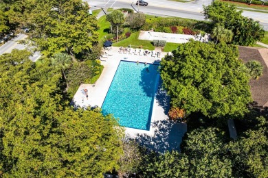 Welcome HOME to this updated corner unit with an open-concept on Palm-Aire Country Club and Resort - The Oaks in Florida - for sale on GolfHomes.com, golf home, golf lot