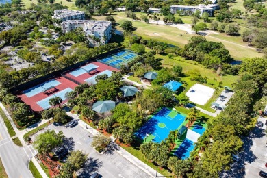 Welcome HOME to this updated corner unit with an open-concept on Palm-Aire Country Club and Resort - The Oaks in Florida - for sale on GolfHomes.com, golf home, golf lot