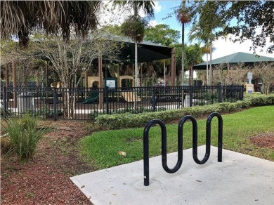 Welcome HOME to this updated corner unit with an open-concept on Palm-Aire Country Club and Resort - The Oaks in Florida - for sale on GolfHomes.com, golf home, golf lot