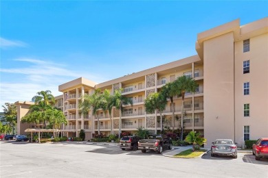 Welcome HOME to this updated corner unit with an open-concept on Palm-Aire Country Club and Resort - The Oaks in Florida - for sale on GolfHomes.com, golf home, golf lot