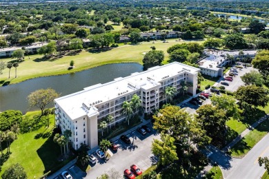 Welcome HOME to this updated corner unit with an open-concept on Palm-Aire Country Club and Resort - The Oaks in Florida - for sale on GolfHomes.com, golf home, golf lot