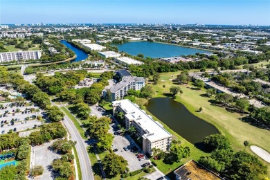 Welcome HOME to this updated corner unit with an open-concept on Palm-Aire Country Club and Resort - The Oaks in Florida - for sale on GolfHomes.com, golf home, golf lot