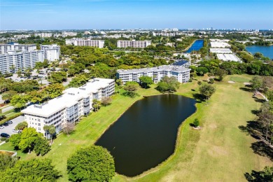 Welcome HOME to this updated corner unit with an open-concept on Palm-Aire Country Club and Resort - The Oaks in Florida - for sale on GolfHomes.com, golf home, golf lot
