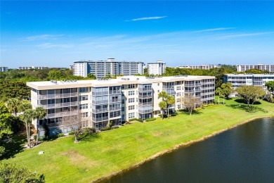 Welcome HOME to this updated corner unit with an open-concept on Palm-Aire Country Club and Resort - The Oaks in Florida - for sale on GolfHomes.com, golf home, golf lot