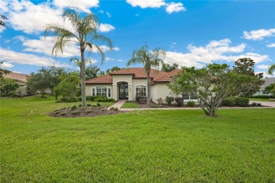 Tucked away on a spacious private lot in the guard gated on Lake Jovita Golf and Country Club in Florida - for sale on GolfHomes.com, golf home, golf lot