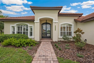 Tucked away on a spacious private lot in the guard gated on Lake Jovita Golf and Country Club in Florida - for sale on GolfHomes.com, golf home, golf lot