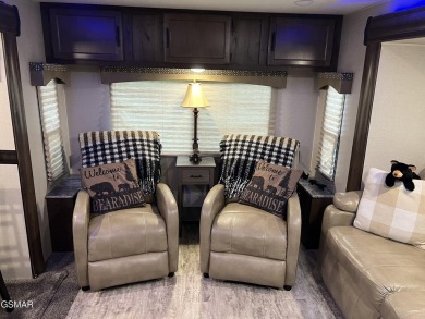Nice RV lot with plenty of trees, nice patio, and firepit area on Bent Creek Golf Course in Tennessee - for sale on GolfHomes.com, golf home, golf lot