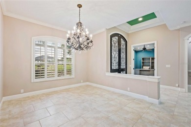 Tucked away on a spacious private lot in the guard gated on Lake Jovita Golf and Country Club in Florida - for sale on GolfHomes.com, golf home, golf lot