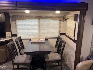 Nice RV lot with plenty of trees, nice patio, and firepit area on Bent Creek Golf Course in Tennessee - for sale on GolfHomes.com, golf home, golf lot
