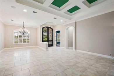 Tucked away on a spacious private lot in the guard gated on Lake Jovita Golf and Country Club in Florida - for sale on GolfHomes.com, golf home, golf lot