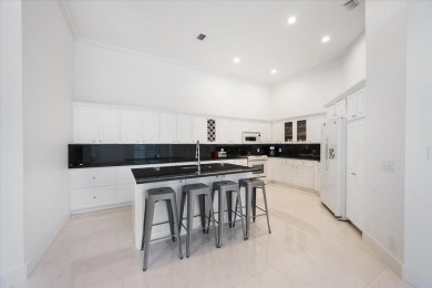 Welcome to this beautifully renovated 5 BED | 4.5 BATH home in on Palm Beach Polo and Country Club in Florida - for sale on GolfHomes.com, golf home, golf lot