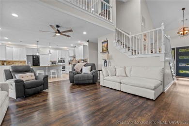 Discover this stunning home on a lakefront lot in the on Woodlake Country Club in North Carolina - for sale on GolfHomes.com, golf home, golf lot