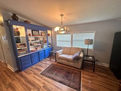 This well-loved 2-bedroom, 2-bathroom Palm Harbor home is being on Del Tura Golf and Country Club in Florida - for sale on GolfHomes.com, golf home, golf lot