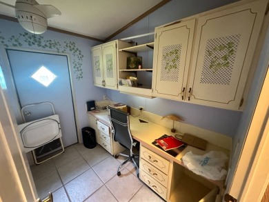 This well-loved 2-bedroom, 2-bathroom Palm Harbor home is being on Del Tura Golf and Country Club in Florida - for sale on GolfHomes.com, golf home, golf lot