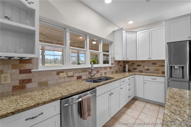 Discover this stunning home on a lakefront lot in the on Woodlake Country Club in North Carolina - for sale on GolfHomes.com, golf home, golf lot