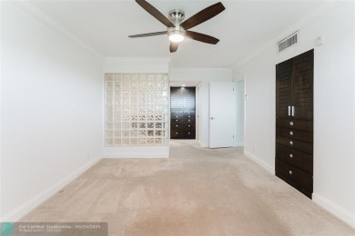 This beautiful 2-bedroom 2-bathroom condo located in the on Palm-Aire Country Club and Resort - Palms in Florida - for sale on GolfHomes.com, golf home, golf lot