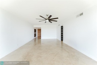 This beautiful 2-bedroom 2-bathroom condo located in the on Palm-Aire Country Club and Resort - Palms in Florida - for sale on GolfHomes.com, golf home, golf lot