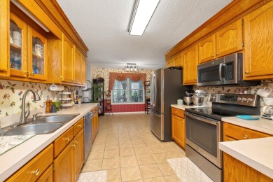 This beautiful home features luxury vinyl plank and ceramic on Beech Creek Golf Club in South Carolina - for sale on GolfHomes.com, golf home, golf lot