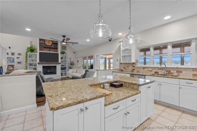 Discover this stunning home on a lakefront lot in the on Woodlake Country Club in North Carolina - for sale on GolfHomes.com, golf home, golf lot