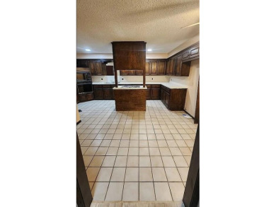 Beautifully updated townhome with golf course views in the heart on KickingBird Golf Course in Oklahoma - for sale on GolfHomes.com, golf home, golf lot