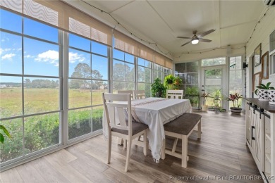 Discover this stunning home on a lakefront lot in the on Woodlake Country Club in North Carolina - for sale on GolfHomes.com, golf home, golf lot