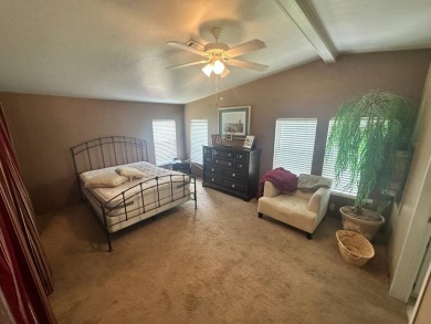 This well-loved 2-bedroom, 2-bathroom Palm Harbor home is being on Del Tura Golf and Country Club in Florida - for sale on GolfHomes.com, golf home, golf lot