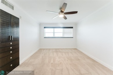 This beautiful 2-bedroom 2-bathroom condo located in the on Palm-Aire Country Club and Resort - Palms in Florida - for sale on GolfHomes.com, golf home, golf lot