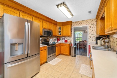 This beautiful home features luxury vinyl plank and ceramic on Beech Creek Golf Club in South Carolina - for sale on GolfHomes.com, golf home, golf lot