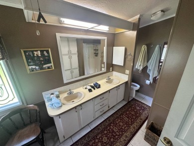 This well-loved 2-bedroom, 2-bathroom Palm Harbor home is being on Del Tura Golf and Country Club in Florida - for sale on GolfHomes.com, golf home, golf lot