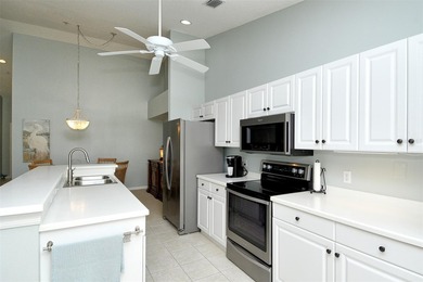 Take a look at this beautifully updated second-floor Drummond on Heritage Oaks Golf and Country Club in Florida - for sale on GolfHomes.com, golf home, golf lot