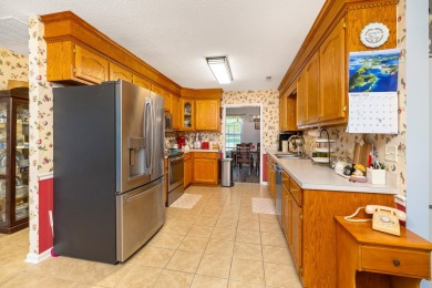 This beautiful home features luxury vinyl plank and ceramic on Beech Creek Golf Club in South Carolina - for sale on GolfHomes.com, golf home, golf lot