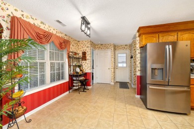 This beautiful home features luxury vinyl plank and ceramic on Beech Creek Golf Club in South Carolina - for sale on GolfHomes.com, golf home, golf lot