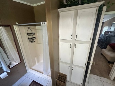 This well-loved 2-bedroom, 2-bathroom Palm Harbor home is being on Del Tura Golf and Country Club in Florida - for sale on GolfHomes.com, golf home, golf lot