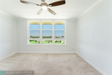 This beautiful 2-bedroom 2-bathroom condo located in the on Palm-Aire Country Club and Resort - Palms in Florida - for sale on GolfHomes.com, golf home, golf lot