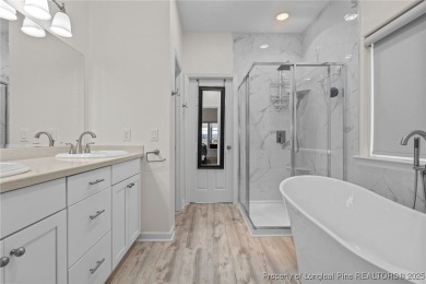 Discover this stunning home on a lakefront lot in the on Woodlake Country Club in North Carolina - for sale on GolfHomes.com, golf home, golf lot