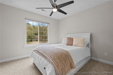 Discover this stunning home on a lakefront lot in the on Woodlake Country Club in North Carolina - for sale on GolfHomes.com, golf home, golf lot